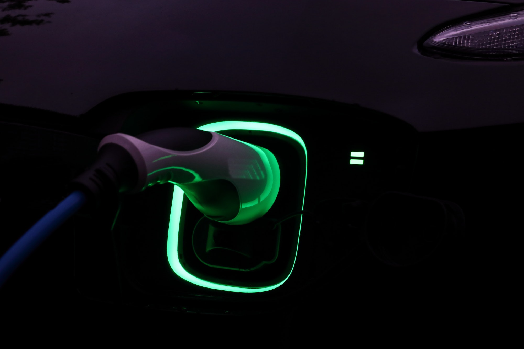 Electric car charging at night